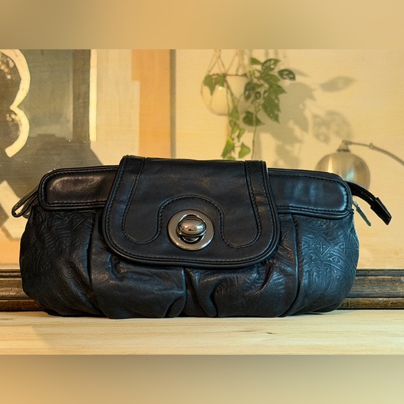 Danier Handbags - Beautiful DANIER large leather clutch
